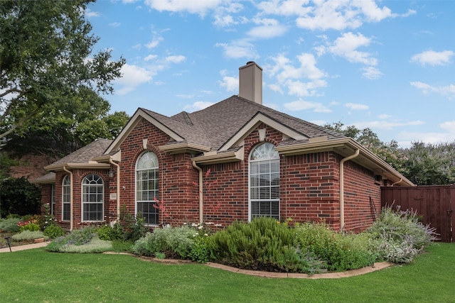 1306 Glendover Dr, Allen, TX 75013 - view of front of property featuring brick siding, a chimney, and roof with shingles
