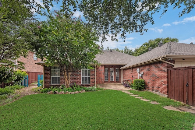 1306 Glendover Dr, Allen, TX 75013 - rear view of property with brick siding, a shingled roof, and a patio area