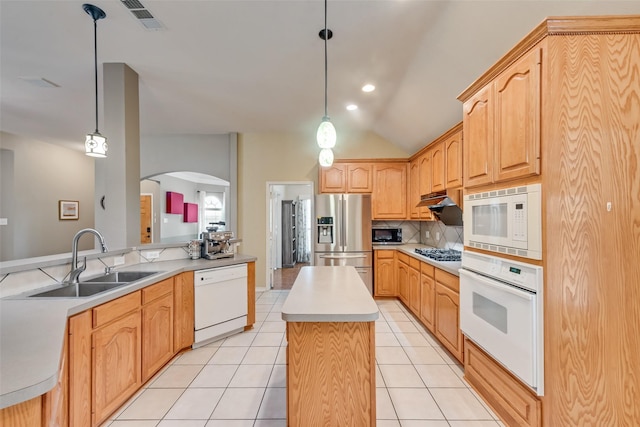 1306 Glendover Dr, Allen, TX 75013 - kitchen featuring white appliances, arched walkways, a kitchen island, decorative backsplash, and decorative light fixtures
