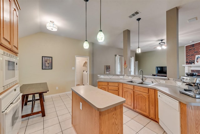 1306 Glendover Dr, Allen, TX 75013 - kitchen featuring white appliances, a kitchen island, ceiling fan, light countertops, and light tile patterned floors