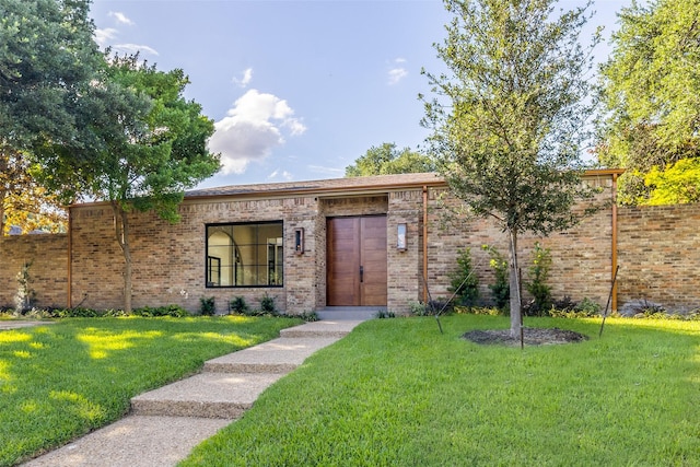 9701 Faircrest Dr, Dallas, TX 75238 - view of front of home with a front lawn and brick siding