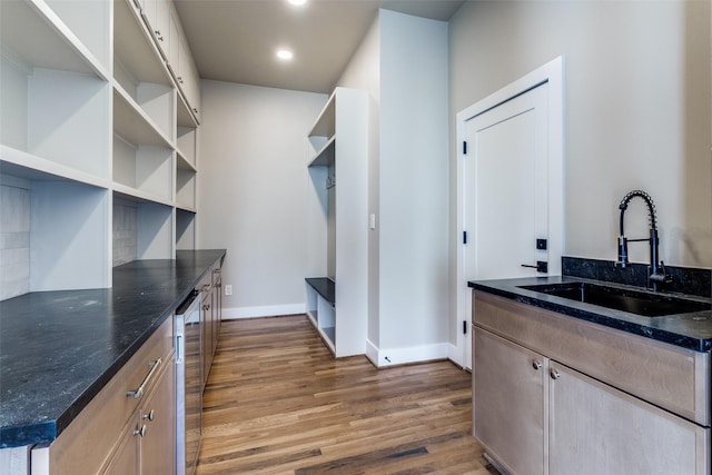 9701 Faircrest Dr, Dallas, TX 75238 - laundry area with wood finished floors, wine cooler, and recessed lighting