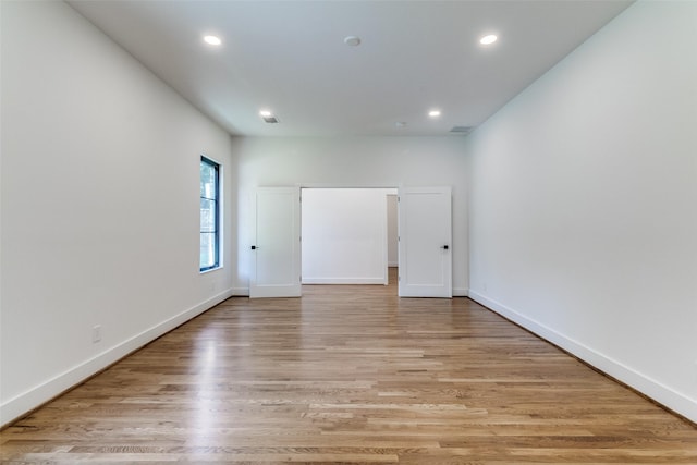 9701 Faircrest Dr, Dallas, TX 75238 - spare room with recessed lighting and light wood-style flooring