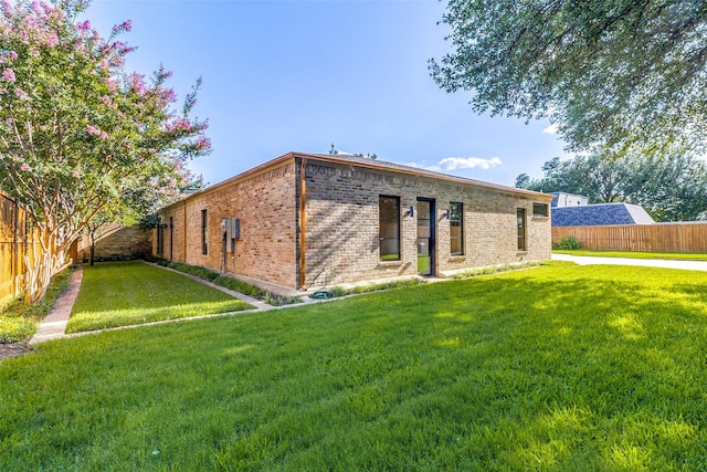 9701 Faircrest Dr, Dallas, TX 75238 - view of front facade featuring brick siding and a fenced backyard