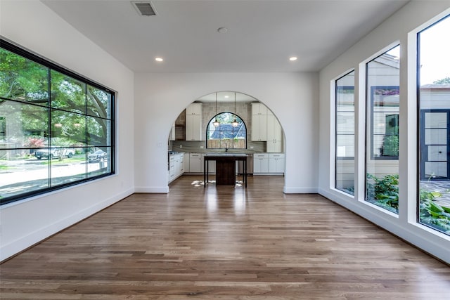9701 Faircrest Dr, Dallas, TX 75238 - unfurnished living room with wood finished floors and recessed lighting