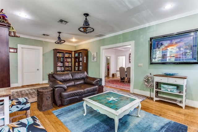 1320 Madeline Pl, Fort Worth, TX 76107 - living room with wood finished floors, crown molding, and recessed lighting