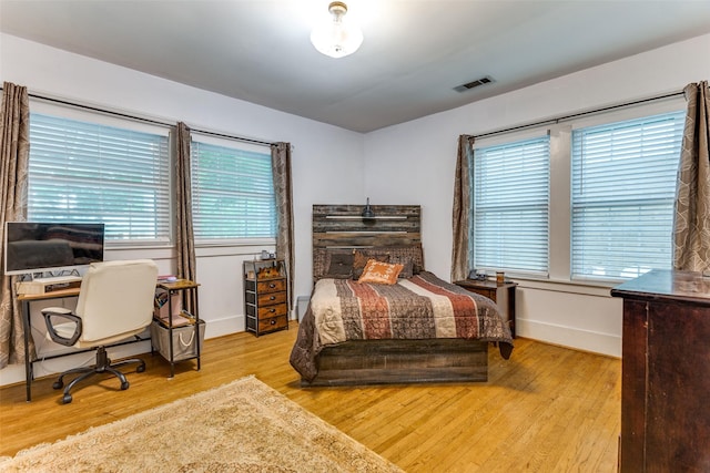 1320 Madeline Pl, Fort Worth, TX 76107 - bedroom with wood finished floors and a desk