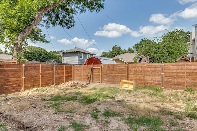 1320 Madeline Pl, Fort Worth, TX 76107 - fenced backyard featuring an outdoor structure