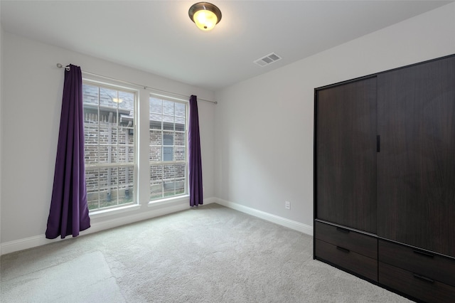 505 Proud Knight Ln, Lewisville, TX 75056 - unfurnished bedroom featuring carpet flooring and baseboards
