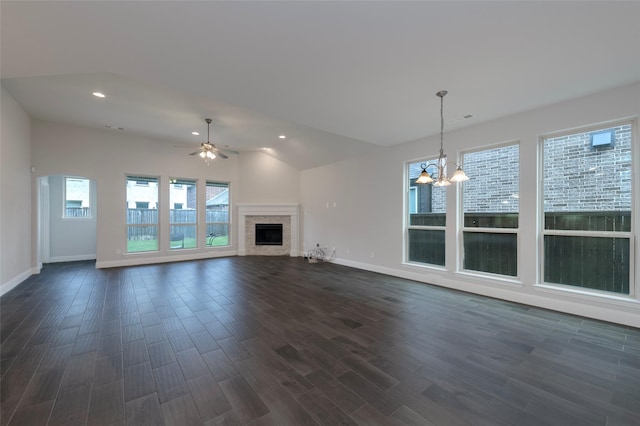 505 Proud Knight Ln, Lewisville, TX 75056 - unfurnished living room with a fireplace, a chandelier, ceiling fan, dark wood-style flooring, and recessed lighting