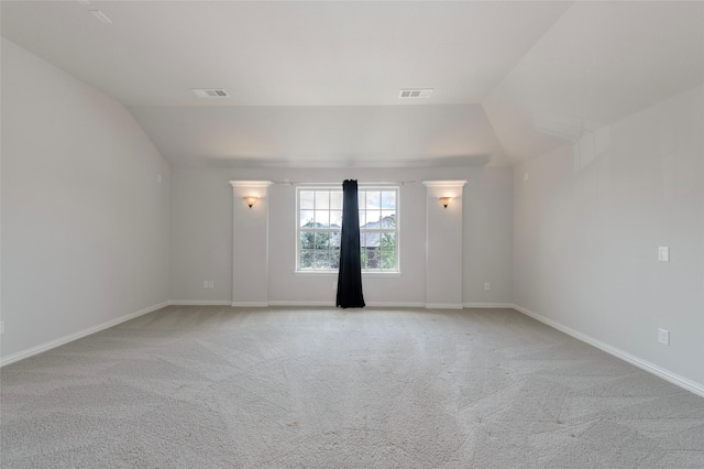 505 Proud Knight Ln, Lewisville, TX 75056 - unfurnished room featuring vaulted ceiling and light carpet