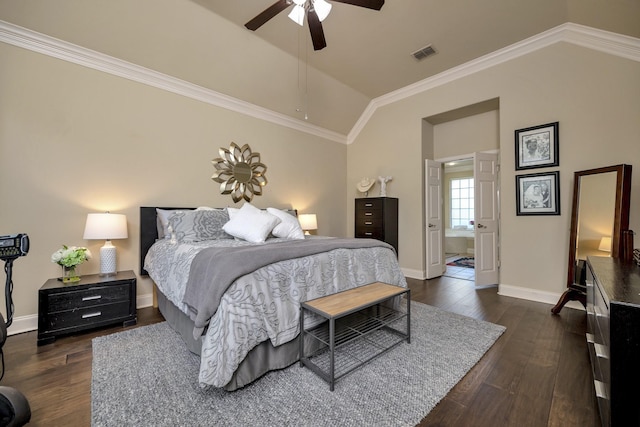 700 Paradise Cv, Shady Shores, TX 76208 - bedroom featuring vaulted ceiling, dark wood finished floors, ceiling fan, connected bathroom, and crown molding