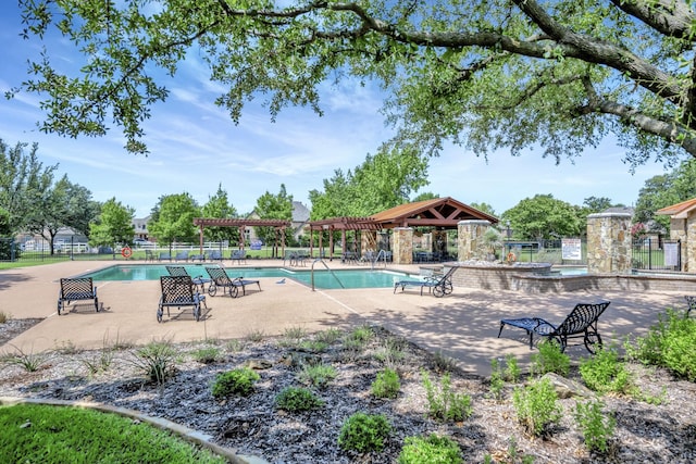 700 Paradise Cv, Shady Shores, TX 76208 - community pool featuring a pergola and a patio area
