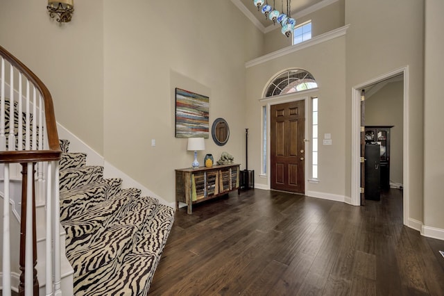 700 Paradise Cv, Shady Shores, TX 76208 - entryway featuring stairs, plenty of natural light, dark wood-type flooring, a towering ceiling, and crown molding