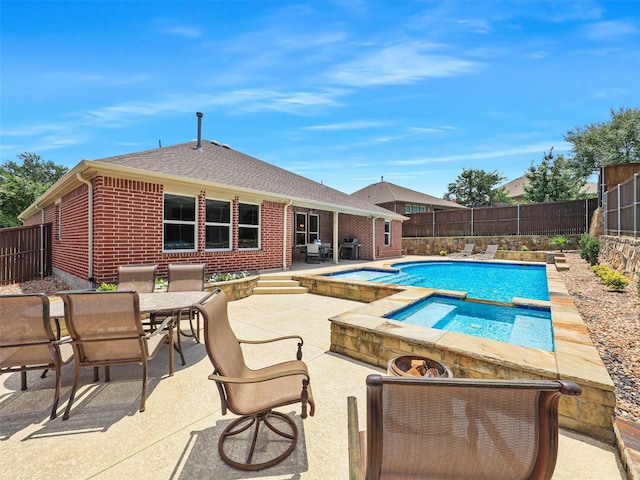 505 Peterhouse Dr, Mckinney, TX 75071 - view of swimming pool featuring a patio, a fenced backyard, outdoor dining area, a pool with connected hot tub, and area for grilling