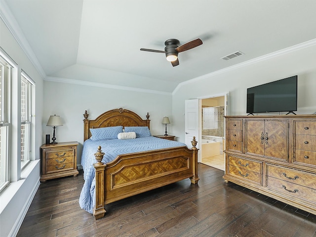 505 Peterhouse Dr, Mckinney, TX 75071 - bedroom with dark wood-type flooring, ornamental molding, ensuite bathroom, a ceiling fan, and a raised ceiling