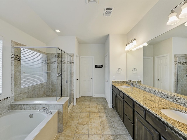 505 Peterhouse Dr, Mckinney, TX 75071 - full bath featuring a bath, double vanity, and a shower stall