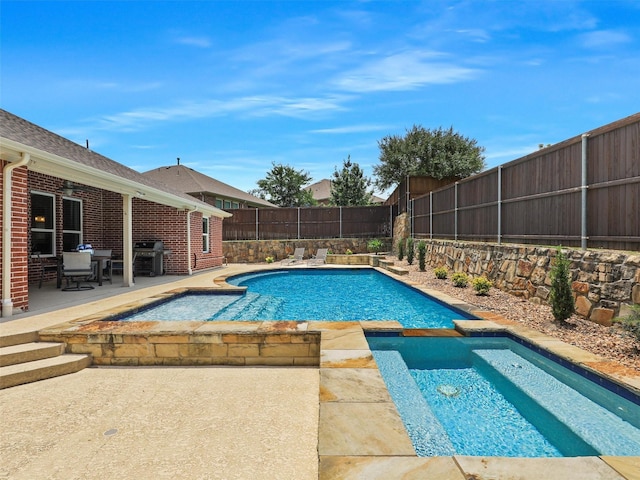505 Peterhouse Dr, Mckinney, TX 75071 - view of pool featuring a fenced backyard, a patio area, a grill, and a pool with connected hot tub