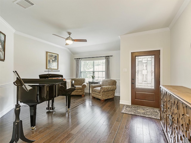 505 Peterhouse Dr, Mckinney, TX 75071 - entrance foyer with crown molding, dark wood-style flooring, and ceiling fan