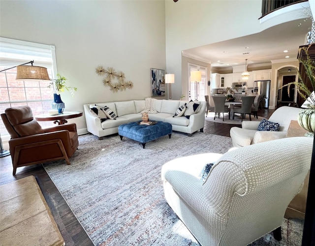 4716 Eva Pl, Plano, TX 75093 - living area featuring a towering ceiling, ornamental molding, and recessed lighting