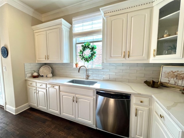 4716 Eva Pl, Plano, TX 75093 - kitchen with stainless steel dishwasher, dark wood-style floors, decorative backsplash, crown molding, and light stone countertops