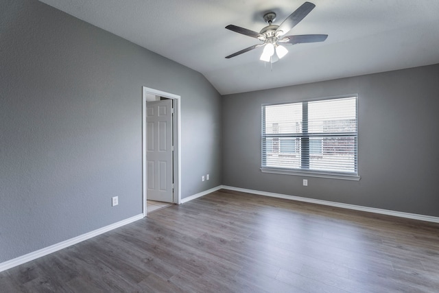 3106 Connor Ln, Wylie, TX 75098 - spare room featuring a ceiling fan, wood finished floors, lofted ceiling, and a textured wall