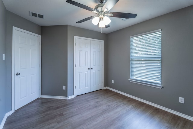 3106 Connor Ln, Wylie, TX 75098 - unfurnished bedroom with wood finished floors, a closet, and ceiling fan