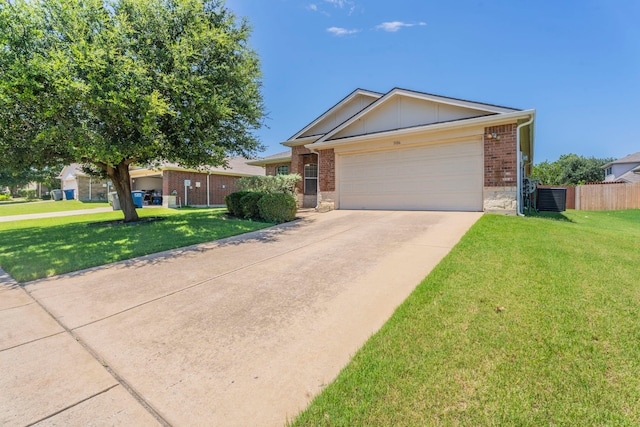 3106 Connor Ln, Wylie, TX 75098 - single story home with concrete driveway, an attached garage, brick siding, and board and batten siding