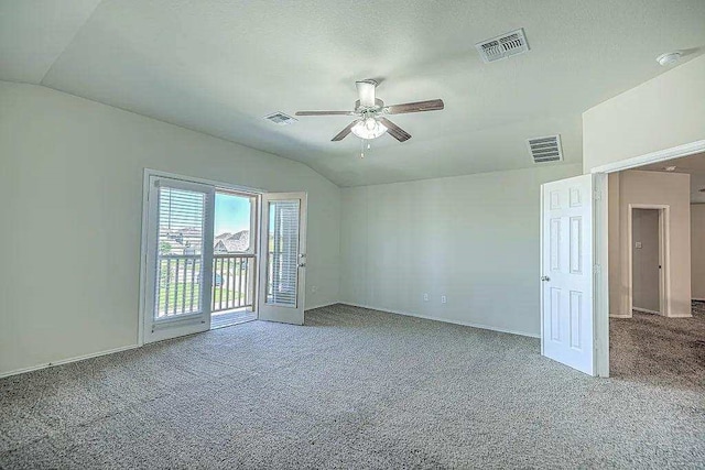 9207 Lake Pointe Dr, Temple, TX 76502 - carpeted spare room with vaulted ceiling and a ceiling fan