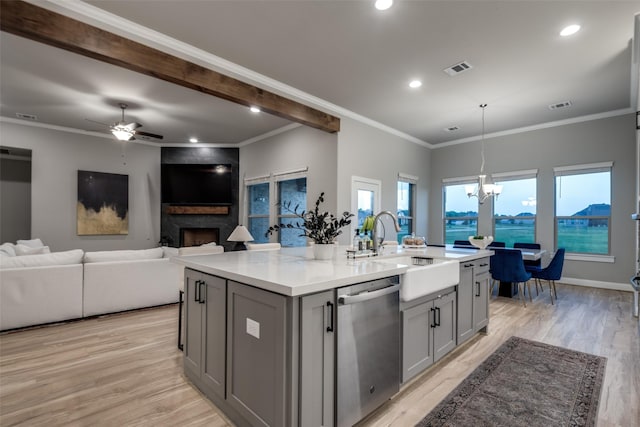 1301 Wilderness Ln, Forney, TX 75126 - kitchen featuring stainless steel dishwasher, gray cabinets, a fireplace, a chandelier, and recessed lighting
