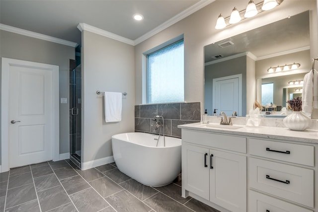 1301 Wilderness Ln, Forney, TX 75126 - full bathroom featuring a freestanding bath, vanity, a shower stall, crown molding, and recessed lighting