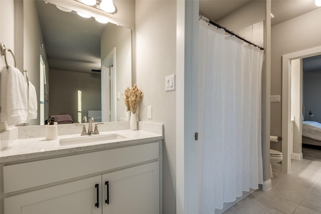 1301 Wilderness Ln, Forney, TX 75126 - full bath with ensuite bath, tile patterned flooring, and vanity