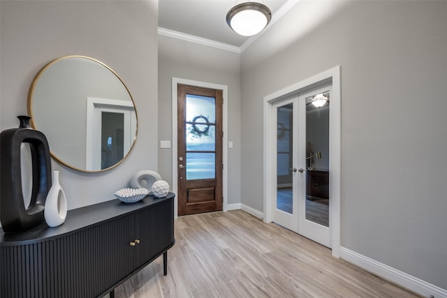 1301 Wilderness Ln, Forney, TX 75126 - entryway featuring french doors, ornamental molding, and light wood finished floors