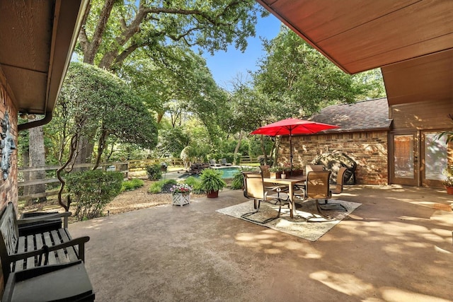 1812 Winding Creek Blvd, Flower Mound, TX 75022 - view of patio / terrace featuring a pool and outdoor dining space