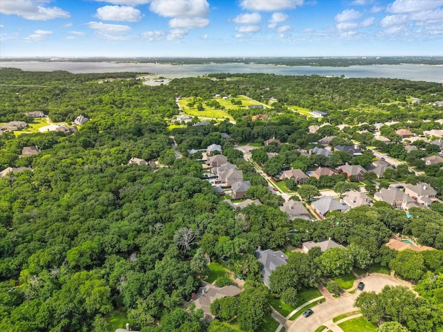 1812 Winding Creek Blvd, Flower Mound, TX 75022 - aerial view of residential area featuring a nearby body of water and a forest