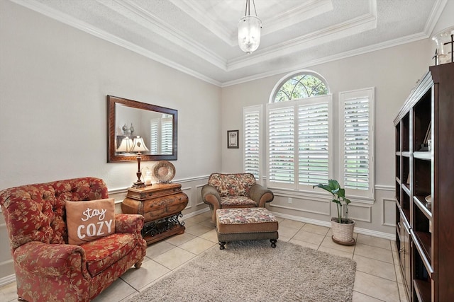 1812 Winding Creek Blvd, Flower Mound, TX 75022 - sitting room with tile patterned floors, crown molding, and a tray ceiling