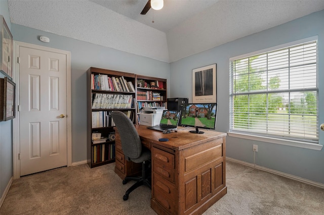 901 Brown Trl, Coppell, TX 75019 - home office with light carpet, a ceiling fan, lofted ceiling, and a textured ceiling