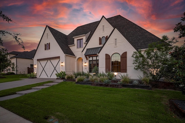 15111 Spider Lily Rd, Frisco, TX 75035 - french country style house with driveway, a front lawn, a garage, roof with shingles, and a standing seam roof