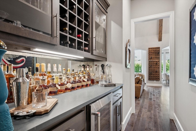 15111 Spider Lily Rd, Frisco, TX 75035 - indoor dry bar with wine cooler and dark wood finished floors