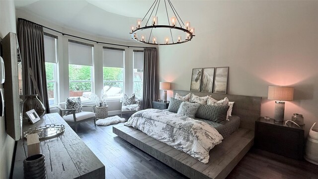 15111 Spider Lily Rd, Frisco, TX 75035 - bedroom featuring wood finished floors and a chandelier