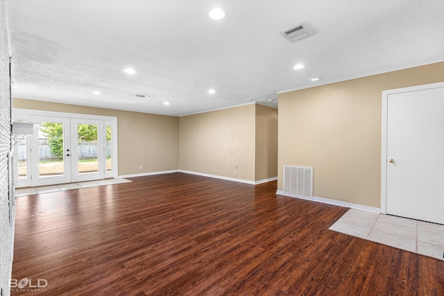 858 River Rd, Shreveport, LA 71105 - empty room with wood finished floors, recessed lighting, crown molding, french doors, and a textured ceiling