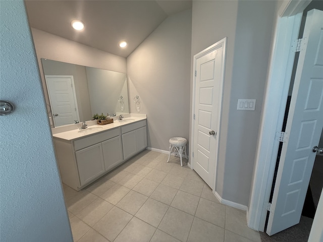 8932 Lantana Meadow Dr, Fort Worth, TX 76131 - bathroom with double vanity, tile patterned flooring, lofted ceiling, and recessed lighting