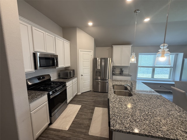 8932 Lantana Meadow Dr, Fort Worth, TX 76131 - kitchen featuring stainless steel appliances, a center island with sink, white cabinets, dark wood-style floors, and recessed lighting