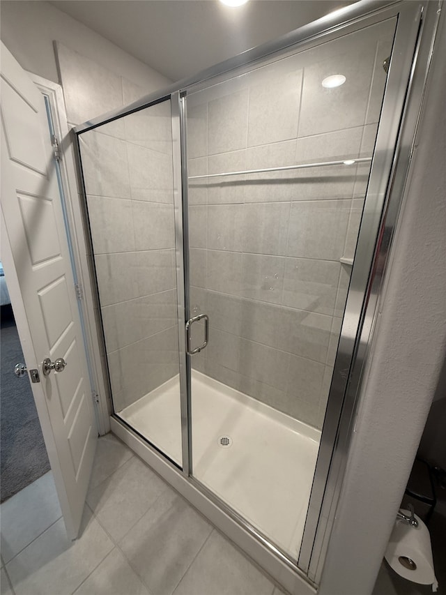 8932 Lantana Meadow Dr, Fort Worth, TX 76131 - bathroom featuring tile patterned floors and a stall shower