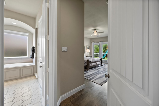4618 Sky Harbor Dr, Rockwall, TX 75087 - hall featuring baseboards and light wood finished floors