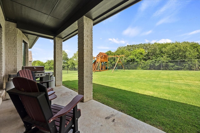 4618 Sky Harbor Dr, Rockwall, TX 75087 - fenced backyard with a patio area, a playground, and grilling area