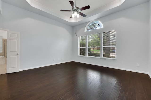 8504 Beatton Ct, Plano, TX 75025 - unfurnished room featuring a raised ceiling, a ceiling fan, crown molding, and wood finished floors