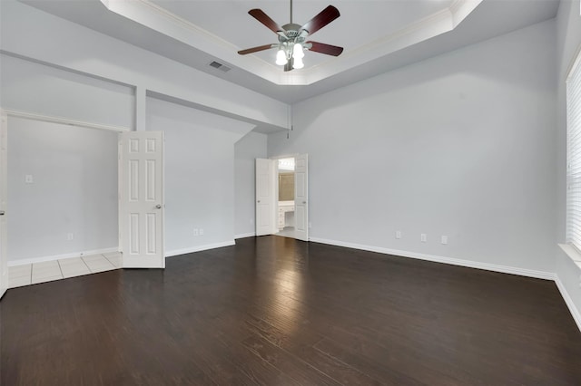 8504 Beatton Ct, Plano, TX 75025 - unfurnished room with a ceiling fan, a raised ceiling, wood finished floors, and ornamental molding