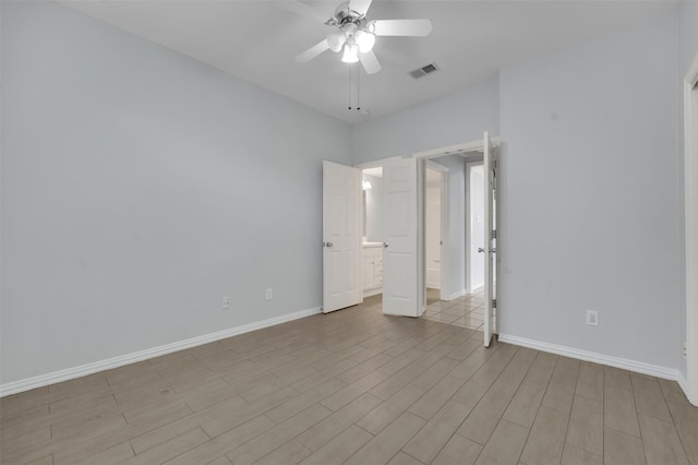 8504 Beatton Ct, Plano, TX 75025 - empty room featuring a ceiling fan and light wood-type flooring