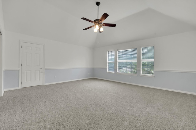 8504 Beatton Ct, Plano, TX 75025 - empty room with vaulted ceiling, ceiling fan, and carpet flooring